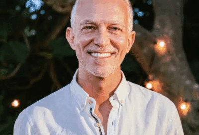 a man smiling at camera, representing cosmetic dentistry in Lansdowne VA