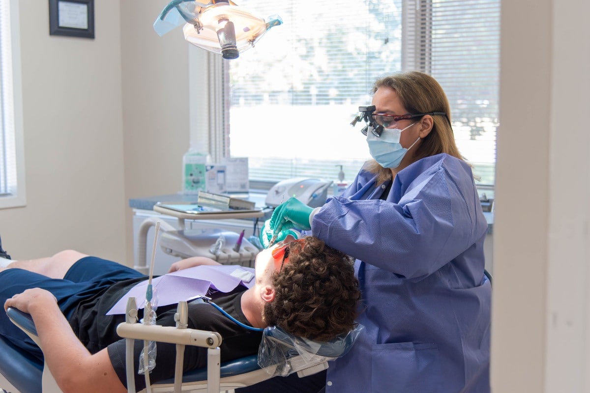 Patient receiving comfortable dental treatment at lansdowne dentistry by design in lansdowne, va