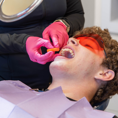 Patient receiving a dental exam and check-up at Lansdowne Dentistry by Design in Lansdowne, VA, representing dental check-up questions